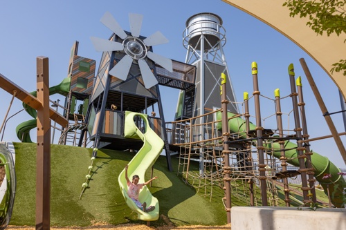 Playstructures on a hill at Thanksgiving Pointe playground