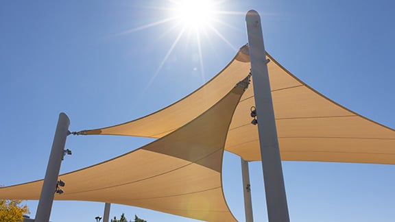 Image of orange triangular shade sails